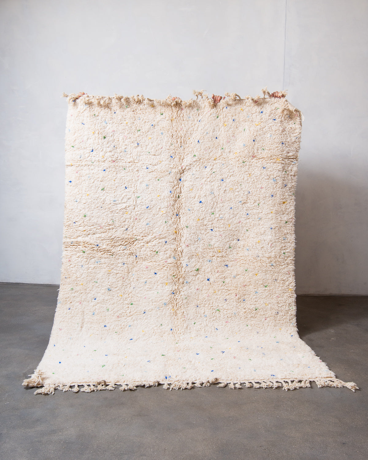 Modern, designer, handcrafted Berber rug from Morocco. Beniourain carpet with beautiful colours and patterns and fluffy wool texture.